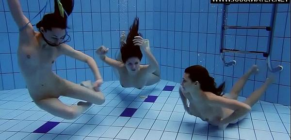  Three hot bitches naked in the pool